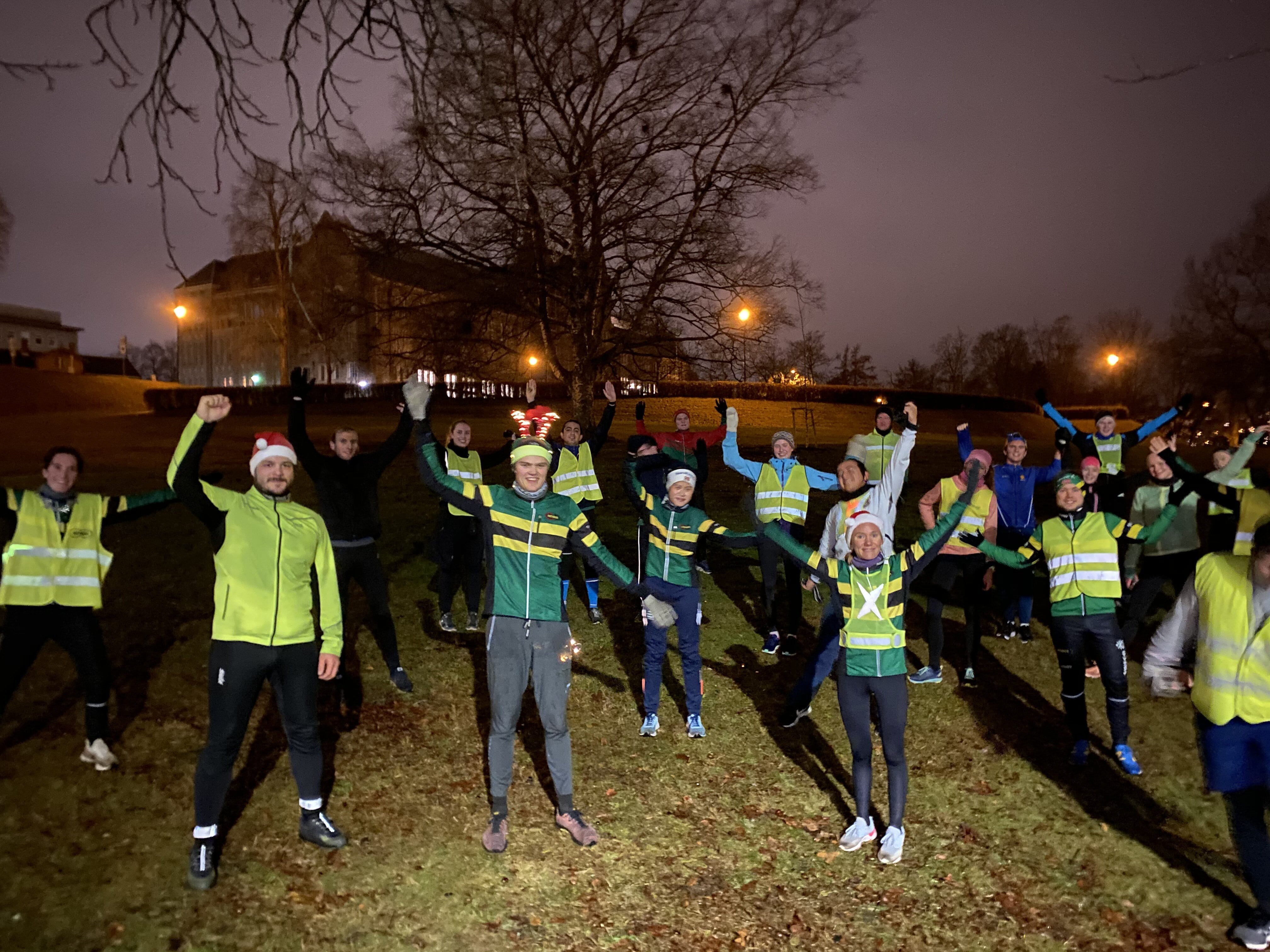 Happy runners with christmas decoration